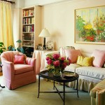 Interior,Wonderful Interior Designer Living Room Design Inspiration With Amazing Sofas Combined Soft Cushions And Beautiful Black Wood Oval Shaped Table Also Cool Corner White Wooden Bookshelves,The Best High Quality And Cheap Interior Designer Living Rooms