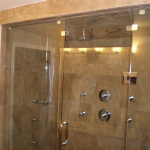 Bathroom,Stunning Small Space Wall Light Design Ideas With Amazing Stainless Steel Handle Sliding Glass Door In Modern Steam Shower And Beautiful Rain Head Shower Also Cool Fixture Wall Light Inside Plus Nice Yellow Graphic Wall Tile Panel,Classic Wall Lights Inside Bathroom