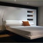Bedroom,Minimalist Small Space Bedroom Design Ideas With Charming White Leather Platform Bed On Combined Comfortable White Bed Sheet And Nice Black Bedside Table Plus Beautiful Cream Table Lamp Also Soft Black Great Rug,Wide Range Of The Latest Modern Bedrooms