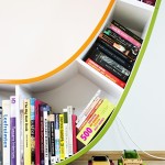 Furniture,Unique And Creative Book Shelf Design Inspiration With Charming Bookworm Chair In Stylish Green White Orange Color Also Gorgeous White Wall Paint Plus Trendy Bright Brown Wood Floor,Contemporary Furniture Book Shelf Designs 2015
