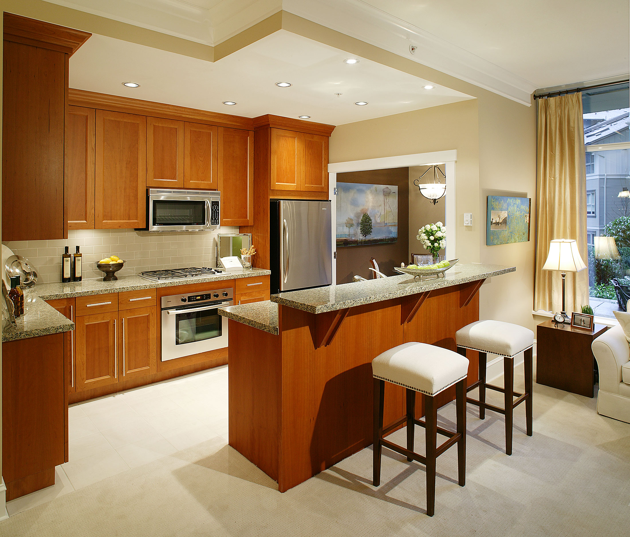 Furniture,Extraordinary Interior Design Picture With Stylish Cherry Wood Kitchen Cabinet And Beautiful Oven Stove Built In Craft Plus Comfortable White Bar Stools Also Wonderful Cream Wall Paint,Pretentious Interior Design Pictures 2015