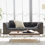 Interior,Unusual Interior Design Photo With Modern Black Two Seater Sofa And Cool Brown Rectangular Table On Combined Soft White Fur Rug Also Beautiful Gray Stone Potted Plant Plus Cool Cream Drum Floor Lamp,Best High Quality Interior Design Photos To Your Living Room