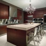 Furniture,Fabulous Beautiful Contemporary Kitchen Design Inspiration With Cool Walnut Venner Kitchen Cabinet In Brown Color And Nice Stainless Blacsplash Also Wonderful Kitchen Island On Combined White Granite Countertop Plus Gorgeous Chandelier For Elegant Concept,Beautiful Contemporary Kitchens