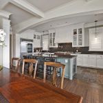 Furniture,Astounding Open Plan Ikea Small Kitchen Design Inspiration With Splendid White Wood Kitchen Cabinet And Nice Clear Glass Floating Kitchen Cabinet Plus Gorgeous Light Blue Kitchen Island On Combined Wonderful Black Countertop Also Cozy Black Leather Bar Stools,Contemporary Ikea Small Kitchen Design Idea