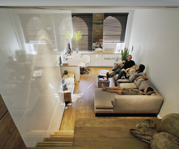 Apartments,Beautiful White Wall Panels Mini Apartment Design Inspiration With Gorgeous Gray Sofa Bed On Combined Nice Bright Wood Floor And Charming Corner Work Desk Plus Comfortable White Office Chair Also Cool Stairway ,Fascinating Mini Apartment Design Inspiration 