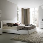 Bedroom,Exquisite Broken White Room Painting Ideas With Charming White Leather Bed Frame On Combined Soft Cream Mattress And Modern White Dresser Plus Elegant Over Chandelier Also Nice Broken White Fur Rug For Modern Concept,Trendy Cute Room Painting Ideas