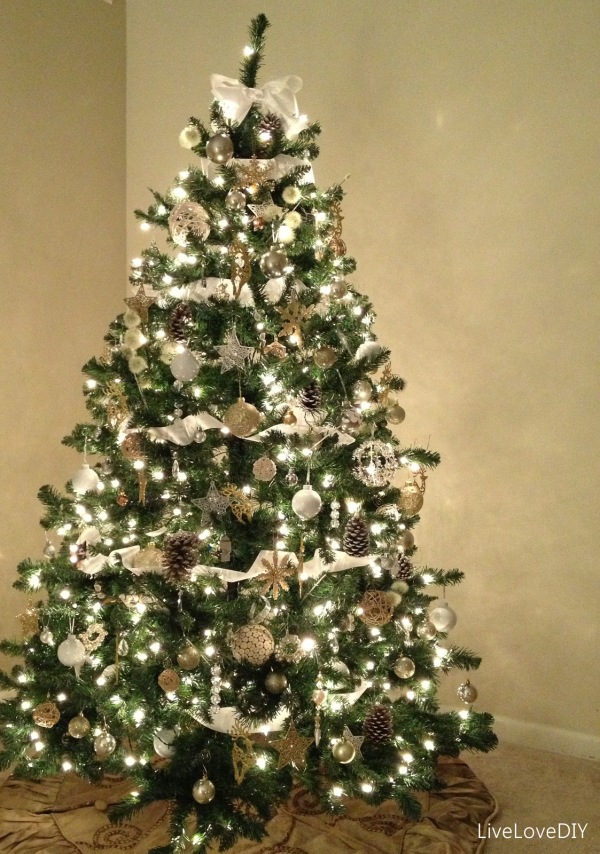 Furniture,Wonderful Indoor Xmas Tree Design Ideas With Adorable Xmas Tree Lights In Beautiful White Color And Gorgeous Shiny Ball Ornaments Also Nice Beige Wall Paints,Awesome Xmas Trees Latest For Christmas