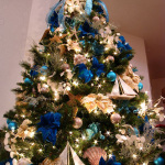 Furniture,Admirable Indoor Xmas Tree Design Ideas With Charming Christmas Having Blue Series Ribbon Flowers And Beautiful Blue Plus White Ball Ornaments Also Stunning Xmas Tree Lights In Nice White Color,Awesome Xmas Trees Latest For Christmas
