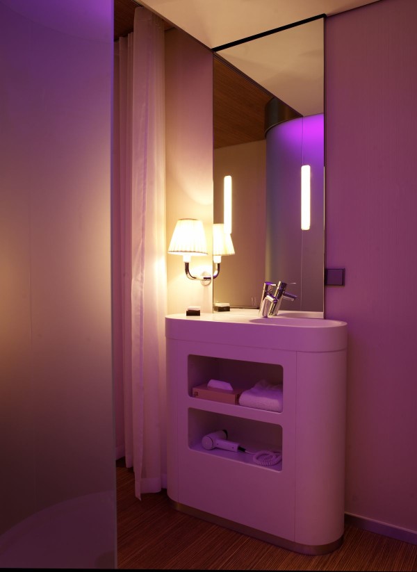 Bathroom,Cute Purple Themed Bathroom 2011 Design With Stylish White Bathroom Vanity Plud Nice Stainless Bathroom Faucet And Wonderful Vertical Wall Mirror Also Soft Large White Curtain,Perfect Bathrooms 2011 Design Modern