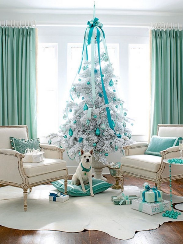 Furniture,Admirable White Wall Paint Christmas Tree Design Inspiration With Adorable White Christmas Tree And Beautiful Blue Ball Ornaments Plus Comfortable White Single Seater Sofa Also Soft White Cowhide Rug On Combined Trendy Brown Wood Floor,Most Beautiful Christmas Tree