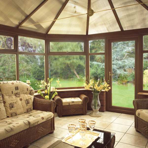 Furniture,Fascinating House Interior Design With Beautiful Brown Rattan Sofa Frames And Cool Rectangular Glass Top Table Plus Beautiful Glass Vase Also Wonderful Brown Window Frames,Modern House Interior Designs