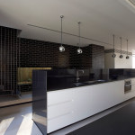 Furniture,Modern Interior Design Architect With Beautiful White Kitchen Cabinet On Combined Nice Black Countertop And Cool Oven Stove Built In Craft Also Gorgeous Chrome Hanging Lamps Using Rustic Black Brick Tile Wall,Modern Interior Design Architects For Your Homes