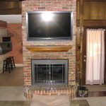 Furniture,Wonderful Brown Brick Stone Wall Panel Flat Screen Tv Wall Design Ideas With Amazing Tv Wall Unit Plus Cool Black Fireplace And Beautiful Open Plan Kitchen Also Nice Black Wood Bar Stools For Rustic Concept,Stunningly Beautiful And Modern Flat Screen Tv Wall Designs