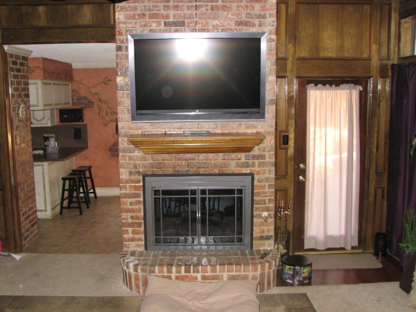 Furniture,Wonderful Brown Brick Stone Wall Panel Flat Screen Tv Wall Design Ideas With Amazing Tv Wall Unit Plus Cool Black Fireplace And Beautiful Open Plan Kitchen Also Nice Black Wood Bar Stools For Rustic Concept,Stunningly Beautiful And Modern Flat Screen Tv Wall Designs