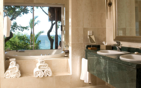 Bathroom,Classy Cream Ceramic Tile Wall Panel Swedish Bathroom Design Ideas With Stunning White Ceramic Round Built In Bathtub And Charming Round White Ceramic Undermount Trough Sink Bathroom Combined Modern Black Granite Countertop Also Picturesque Wall Mirror,Swedish Bathroom Design Modern