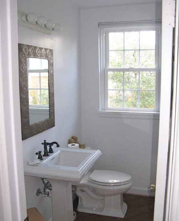 Bathroom,Awesome White Wall Paint Design Small Bathroom With Charming White Freestanding Sink And Beautiful Bronze Bathroom Faucet Plus Cool Glass Mirror Also Comfortable White Ceramic Closet Seat ,Amazing Designing Small Bathrooms