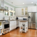 Interior,Enticing Light Blue Wall Paint Small Luxury Kitchen Design Inspiration With Stylish White Wood Kitchen Cabinet And Wonderful White Wood Floating Kitchen Cabinet Plus Charming Stainless Cooker Hood Also Trendy Brown Wood Floor,Best Small Luxury Kitchens Inspiration