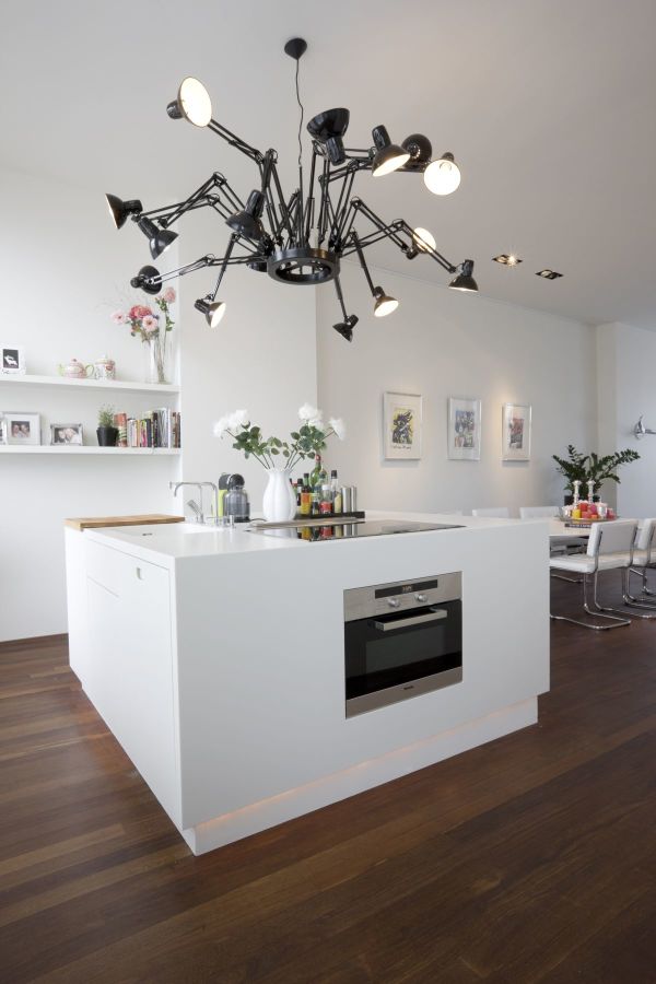 Furniture,Breathtaking White Wall Paint Kitchen Design Ideas With Amazing Great Kitchen Island In Beautiful White Color Plus Nice Brown Wood Floor And Unique Black Over Chandelier Also Picturesque Dining Room ,Luxury Kitchen Designers
