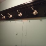 Furniture,Admirable Wall Coat Rack Plan Design Ideas With Charming Black Finished Oak Wood Wall Coat Rack And Beautiful White Five Plastic Dress Hanger Also Gorgeous Blue Wall Paint,Creative And Beautiful Wall Coat Rack Plans In Home