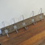 Interior,Extraordinary Coat Hanger Design Ideas With Cool Brown Wooden Coat Hooks And Nice Iron Hooks Also Beautiful White Wall Paint For Vintage Concept,The Best High Quality And Unique Coat Hangers