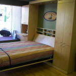 Bedroom,Terrific Lovely Murphy Bed Design Ideas With Delightful Colorful Striped Bed Sheet And Gorgeous Bright Brown Wood Closets Also Trendy Bright Brown Wood Tile Floor,Uniquely Murphy Bed Inspiration For Your Bedroom