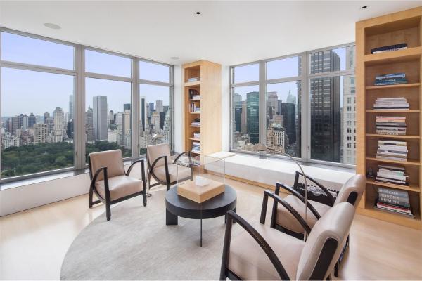 Apartments,Adorable Exclusive Duplex Manhattan Penthouse Apartement Design Ideas With Comfort Living Room And Cozy Beige Leather Chair Also Wonderful Two Tall Wood Bookcase On Combined Bright Laminate Flooring ,Manhattan Penthouse Apartments
