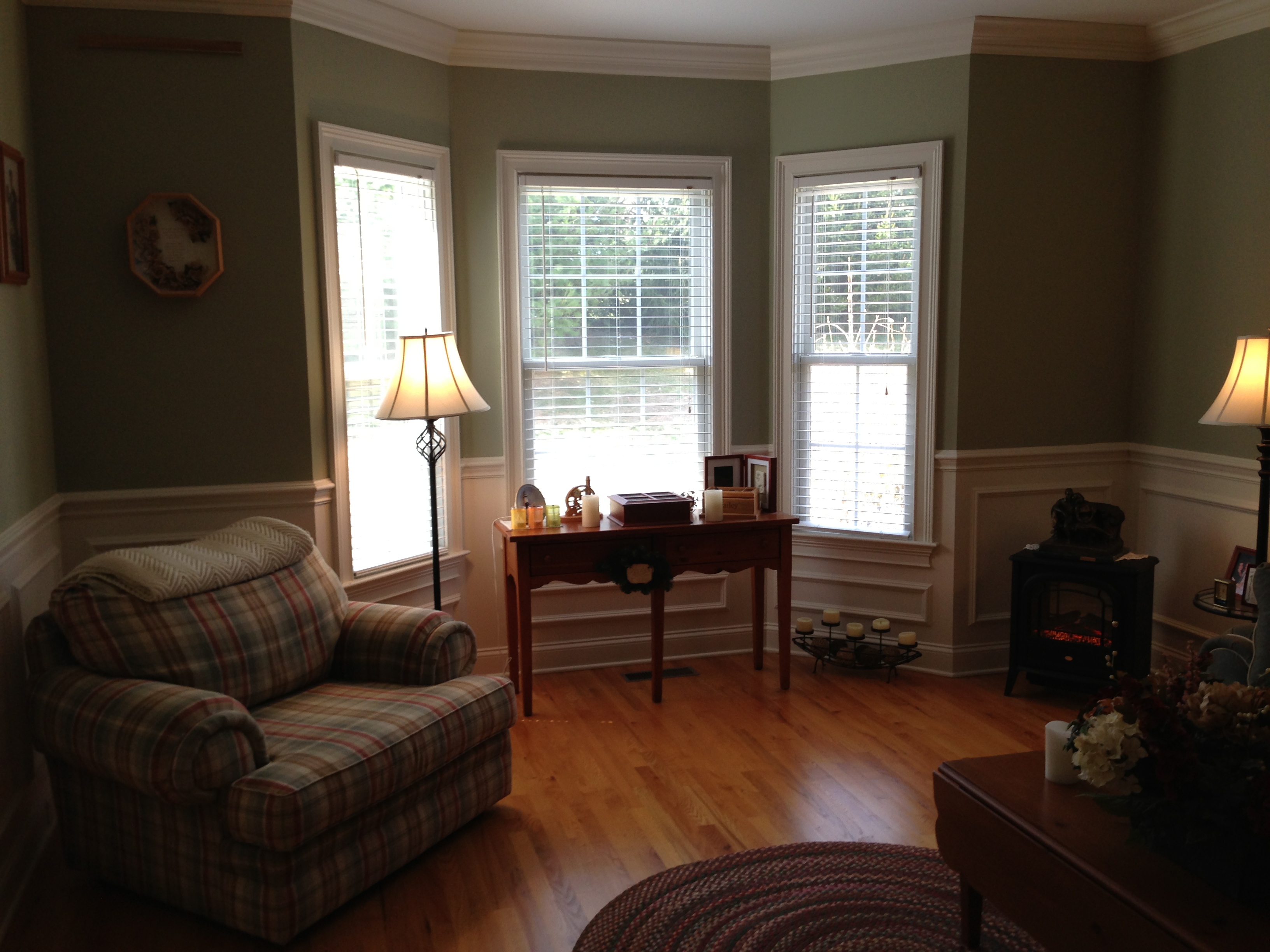 Furniture,Dazzling Small Space Bay Window Decorating With Beautiful White Wood Window Frame And Awesome Single Seater Sofa On Combined Nice Brown Wood Floor Also Cool Brown Wood Narrow Table Plus Gorgeous Floor Lamp,Contemporary Bay Window Decorating