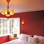 Interior,Amazing Red Wall Bedroom Painting Ideas With Cool White Bed Sheet On Combined Soft White Pillows And Nice Bright Wood Nighstand Table Plus Beautiful Table Lamp Also Traditional Pendant Lamp,Creative Bedroom Painting Ideas