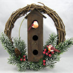 Interior,Cute Christmas Wreath Decorating Ideas With Splendid Birds And Cool Brown Wood Bird Cage Also Gorgeous Snowy Pines Plus Nice Green Pine Cones On Combined Wonderful Red Berries,Make Your Guests Be Impressed To See The Christmas Wreath Decorating Ideas