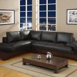 Furniture,Cool Awesome Sofa For Small Living Room Design Inspiration With Comfortable Black Leather Sectional Sofa And Charming Brown Wood Low Coffe Table On Combined Soft Beige Rectangular Rug Plus Nice Bright Wood Floor Also Adorable Desk Lamp For Classy Concept,The Most Convenient Sofas For Small Living Rooms