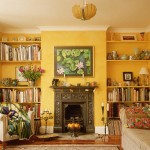 Interior,Enchanting Interior Designer Living Room Design With Charming Brown Fabric Sofas And Beautiful Yellow Bookshelves On The Yellow Wall Also Wonderful Dark Brown Fireplace Plus Splendid White Ceiling,The Best High Quality And Cheap Interior Designer Living Rooms