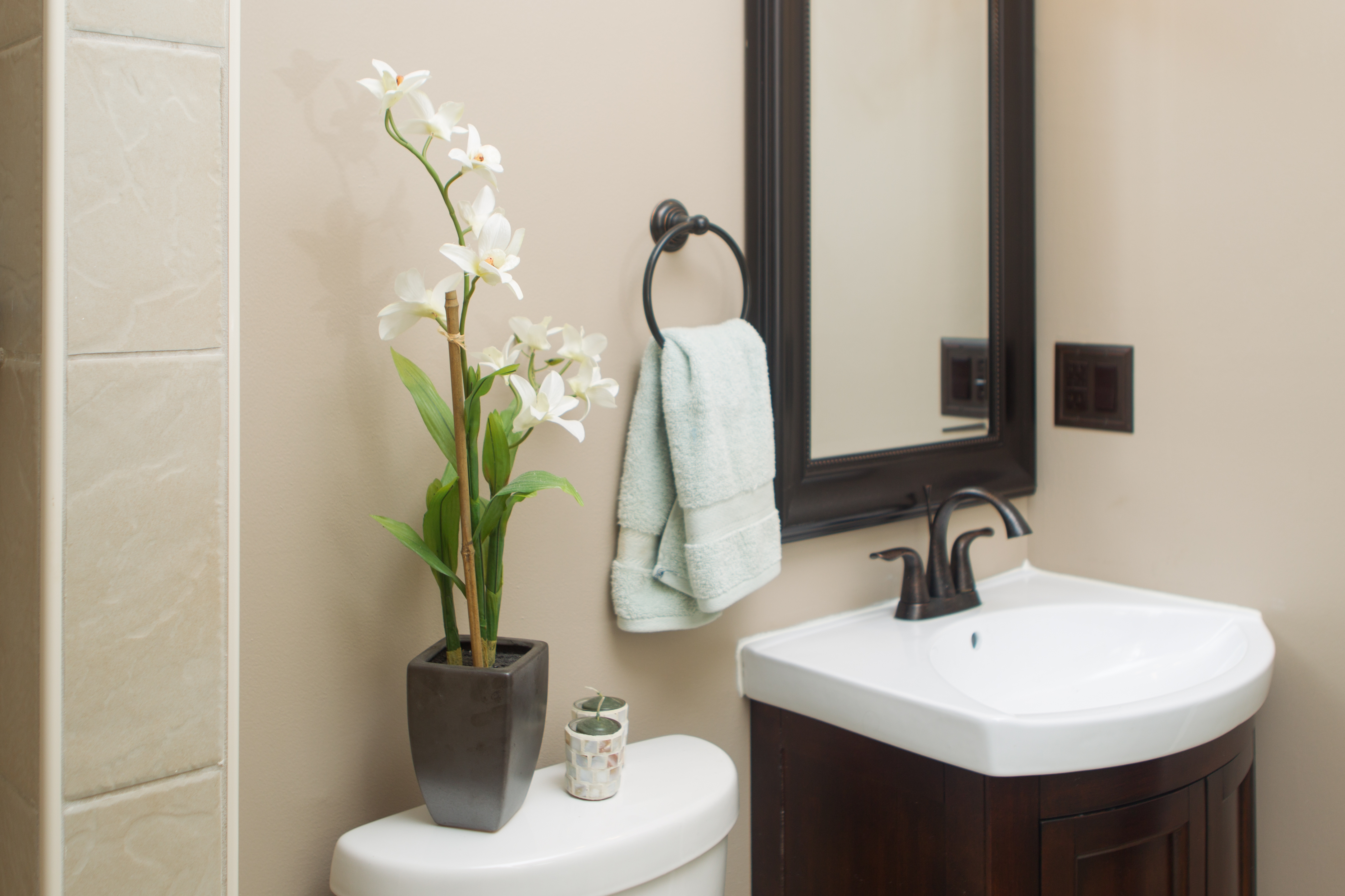 Bathroom,Picturesque Beige Wall Paint Bath Design Inspiration With Beautiful Dark Brown Single Vessel Sink Vanity And Beautiful Oil Rubbed Bathroom Faucet Plus Wonderful Arrangement Floral Also Stunning Wall Mirror ,Admirable Bath Designs To Your Bathroom 
