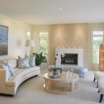 Interior,Fancy Interior Designer Living Room Design With Comfortable White Sofas And Cool Cream Marble Table Plus Beautiful White Drum Floor Lamp Also Extraordinary White Fireplace On The Cream Wall,The Best High Quality And Cheap Interior Designer Living Rooms