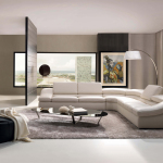 Furniture,Enchanting Large Space Sitting Room Design Ideas With Luxurious White Leather Sectional Sofa Plus Modern Black Oval Glass Table On Combined Soft Grey Area Rug And Modern Arc Floor Also Cool Floating Shelves ,Some Fancy Sitting Rooms