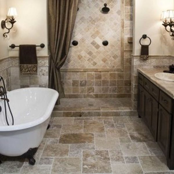 Bathroom,Traditional Small Space Stone Bathroom Design Inspiration With Charming White Ceramic Free Standing Bathtub Plus Beautiful Black Legs On Combined Cool Stone Tile Floor And Gorgeous Wall Light Also Adorable Dark Brown Wood Vanity Cabinet,Natural Stone Bathroom Designs