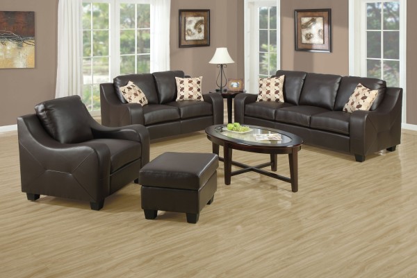 Furniture,Dazzling Large Space Decorative Pillows For Couche With Comfortable Black Leather Sofas And Soft Black Leather Ottoman Plus Gorgeous Oval Glass Table Also Trendy Bright Brown Laminate Flooring,Cute And Pretty Decorative Pillows For Couches