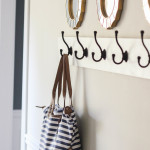 Furniture,Unusual Cream Wall Paint Coat Rack Plan Design Ideas With Amazing White Wood Wall Coat Rack And Cool Black Iron Hooks Also Unique Round Wall Mirrors,Creative And Beautiful Wall Coat Rack Plans In Home