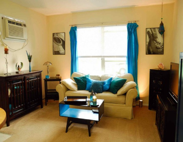 Apartments,Adorable Small Space Furniture For Apartment Design Ideas With Charming Cream Two Seater Sofa And Unique Dark Brown Wood Table Also Antique Dark Brown Wood Cabinet Plus Wonderful Dark Brown Square Accent Table On Combined Cool Stainless Table Lamp,Cheap Furniture For Apartments Decoration Modern