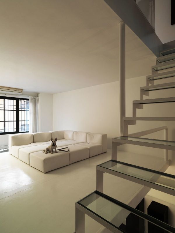 Interior,Adorable Cream Wall Paint Interior Design Inspiration With Modern Large Sofa Bed In Nice Cream Color And Gorgeous Glass Window Plus Wonderful Black Wood Window Frame Also Stunning Stairway ,Minimalist Interior Designers