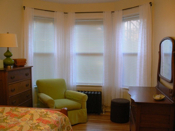 Furniture,Amazing Small Space Bay Window Decorating With Wonderful White Curtains And Comfortable Green Fabric Single Seater Sofa Plus Nice Dark Brown Wood Nightstand Table Also Nice Brown Wood Vanity Table For Bedroom,Contemporary Bay Window Decorating