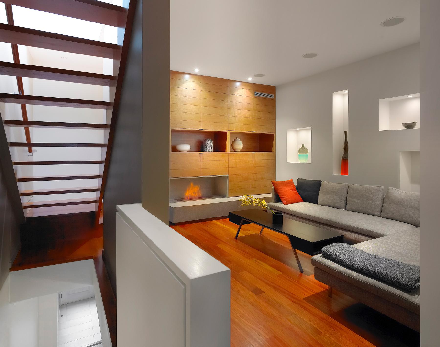 Furniture,Marvelous Interior Design Architect With Stylish White L Shape Sofa And Cool Black Wood Rectangular Table On Combined Nice Brown Wood Floor Also Beautiful White Wall Paint,Modern Interior Design Architects For Your Homes