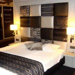 Apartments,Breathtaking Small Space Furniture For Apartment Design Ideas With Cool Black Wood Bed Frame On Combined Comfortable White Bed Cover And Soft White Plus Gray Fabric Pillows Also Gorgeous Cream Bedroom Wall Lights,Cheap Furniture For Apartments Decoration Modern
