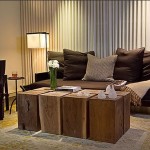 Apartments,Dazzling Cream Wall Paint Furniture For Apartment Design Inspiration With Charming Black Wood Sofa Frame On Combined Soft Black Thick Padded Seat And Cozy Black Wood Chair Also Rustic Bright Brown Wood Coffe Table For Living Room,Cheap Furniture For Apartments Decoration Modern