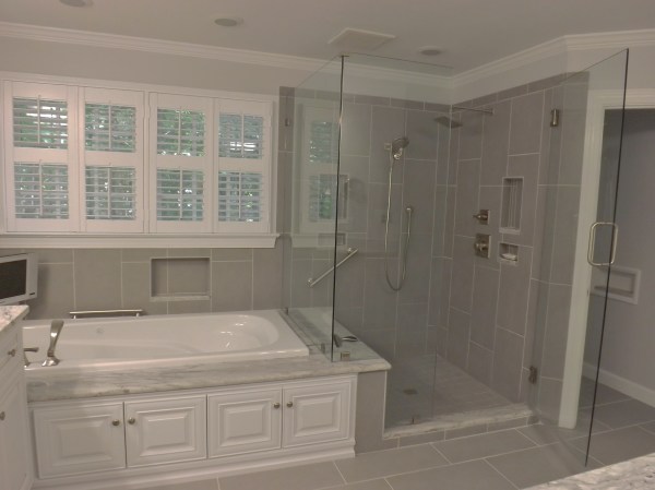 Bathroom,Breathtaking White Gray Themed Overflow Bathtub Design Ideas With Charming White Built In Bathtub Plus Wonderful Gray Tile Floor And Adorable Shower Enclosure Also Beautiful White Blinds,Contemporary Overflowing Bathtubs 