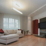 Interior,Stylish Interior Designer Living Room Decoration With Marvelous White Sectional Sofa And Beautiful Bright Brown Laminate Flooring Also Wonderful Entertaiment Center Plus Nice White Wall Paint,The Best High Quality And Cheap Interior Designer Living Rooms