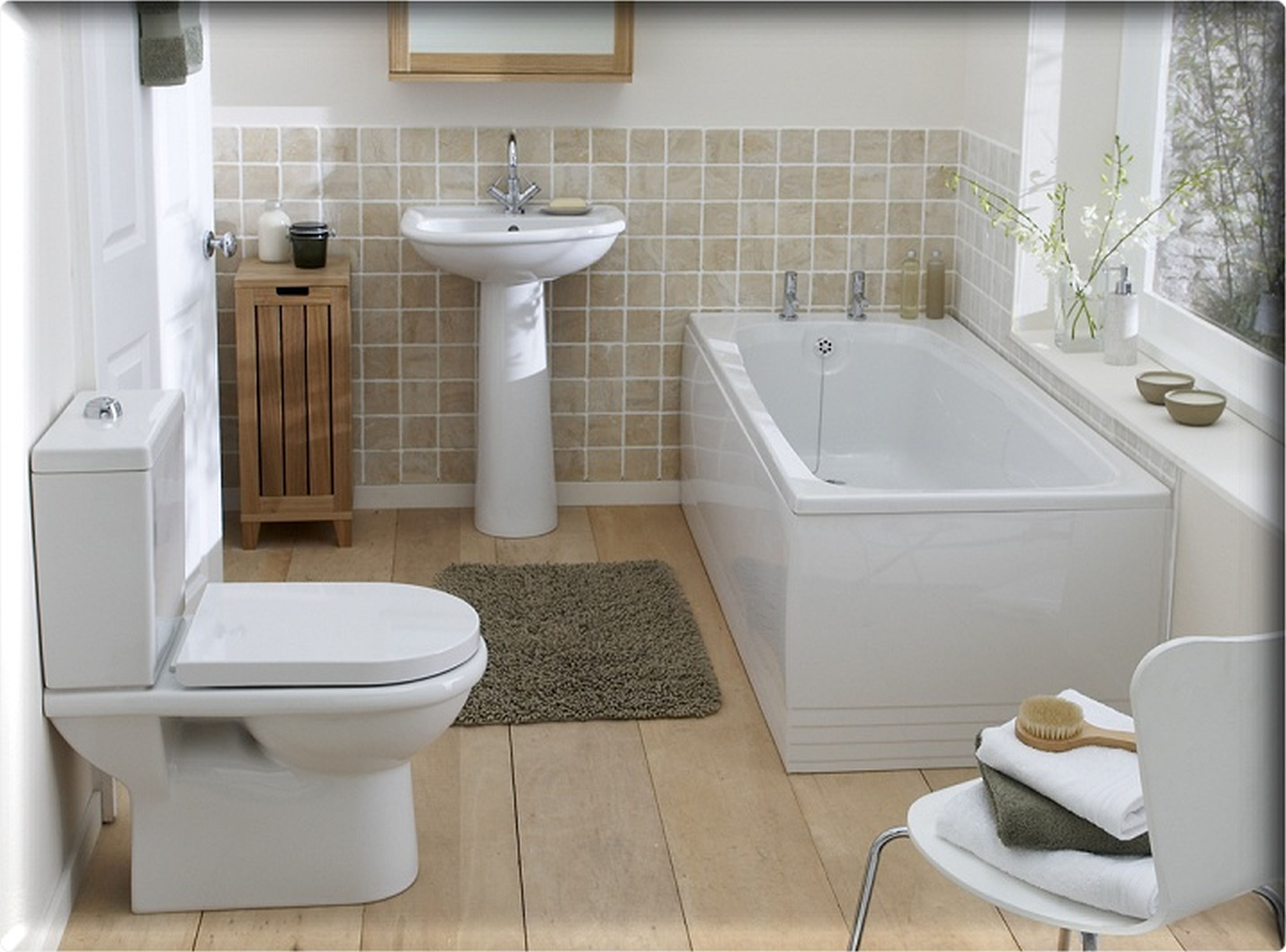 Apartments,Breathtaking Tropical Bathroom Design For Apartement With Charming White Ceramic Closet Seat On Combined Nice Bright Wood Floor And Comfortable White Ceramic Bathtub Also Gorgeous White Ceramic Sink Plus Chrome Faucet,Gorgeous Small Space Bathroom Designs For Apartments