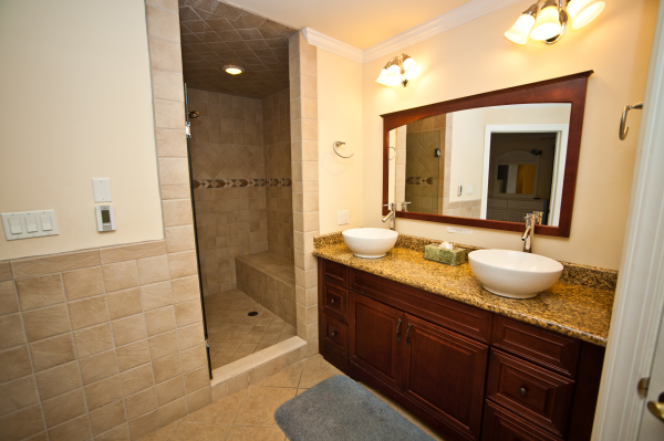 Bathroom,Dazzling Cream Wall Paint Stone Bathroom Design Ideas With Amazing Brown Wood Vanity Cabinet On Combined Beautiful Golden Granite Countertop And Wonderful White Ceramic Vessel Sinks Also Gorgeous Rectangular Wall Mirror,Natural Stone Bathroom Designs