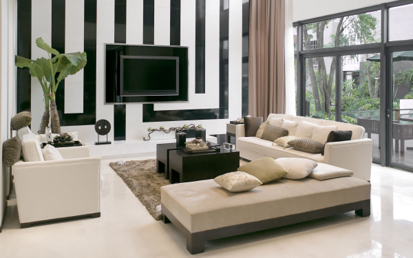 Apartments,Dazzling Black White Wall Panels Bachelor Apartment Design Inspiration With Nice Spectacular White Sofas And Comfortable Large Ottoman Plus Exquisite Black Coffe Tables On Combined Soft Beige Fur Rug Also Modern Tv Wall Units For Classic Concept ,Exceptional Bachelor Apartment Designs