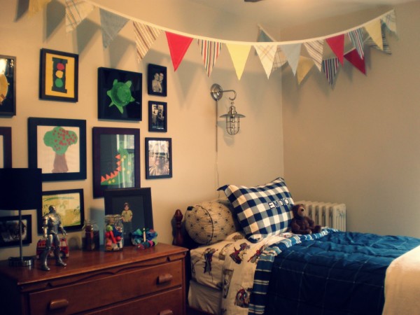 Bedroom,Good Looking Corner Bedroom Ideas For Guy With Picturesque Brown Wood Bed Frame And Nice Brown Wood Dresser Also Gorgeous Black Picture Frames On The White Wall,Good Fresh Bedroom Ideas For Guys