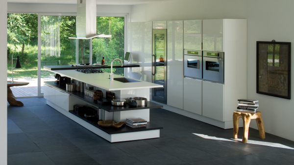 Furniture,Marvelous White Wall Paint Kitchen Island Design Inspiration With Charming White Kitchen Island On Combined Open Shelving Units And Adorable White Cooker Hood Also Modern White Glossy Oven Stove Built In Craft Plus Wonderful Black Stone Tile Floor,Modern Kitchen Island Designs